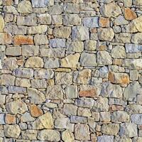 Old wall stone texture and background with rustic tiles design photo