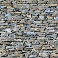 Old wall stone texture and background with rustic tiles design photo