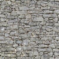 Old wall stone texture and background with rustic tiles design photo