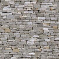 Old wall stone texture and background with rustic tiles design photo