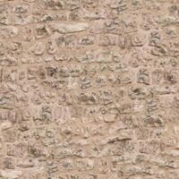Old wall stone texture and background with rustic tiles design photo