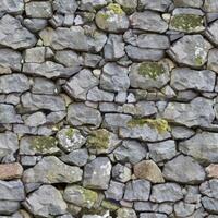 Old wall stone texture and background with rustic tiles design photo