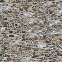 Old wall stone texture and background with rustic tiles design photo