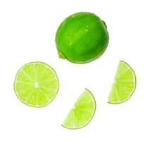 Top view set of green lemon fruit with half and slices isolated on white background with clipping path photo