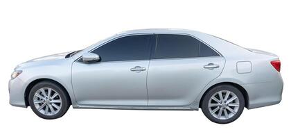 Side view of Bronze or white sedan car isolated on white background with clipping path photo