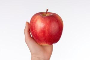 AI generated a person holding a red apple on a white background photo