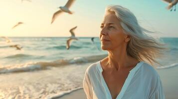 AI generated an older woman standing on the beach with birds flying around her photo