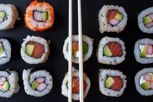 AI generated Sushi pieces placed between chopsticks, separated on black background. photo