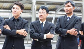 Businessman team standing with arms crossed, Success teamwork concepts photo