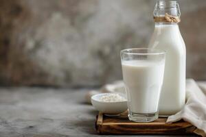 ai generado botella de Leche y vaso con avena copos en de madera mesa. foto