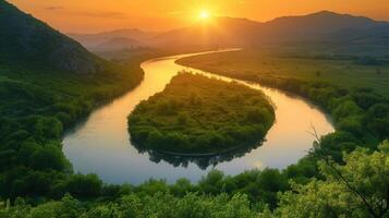 AI generated A winding river cutting through lush greenery, reflecting the golden hues of a breathtaking sunset photo