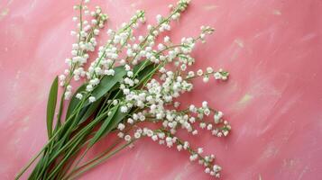 ai generado un hermosa ramo de flores de blanco lirios de el Valle mentiras en el izquierda en un rosado minimalista pastel antecedentes foto