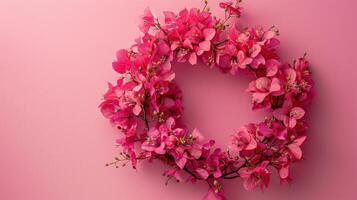 AI generated Flowers composition. Wreath made of pink flowers on pink background photo