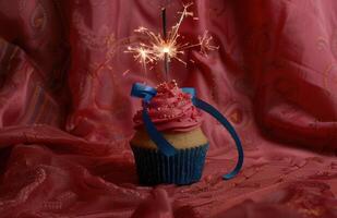 AI generated a pink cupcake with blue ribbon and a sparkler photo