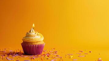 AI generated birthday vivid background with cupcake with candle on yellow photo