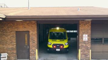 Chicago Illinois 19.03.2022 Illinois Ambulance in Chicago. An ambulance is waiting for a call in the garage. Ambulance and service readiness 911 video