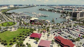 Aerial fly Pinellas County, Florida, United States The city and infrastructure of the island. Cars and houses along the waterfront on a sunny day and tourist season. video
