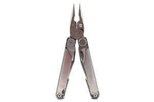 One modern gray iron open folding multifunctional knife isolated on a white background. Multitool with extended tools and pliers. Compact and portable product. Pocket knife. EDC concept. photo