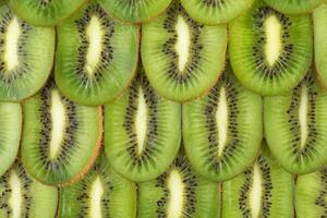 kiwi rebanadas antecedentes foto