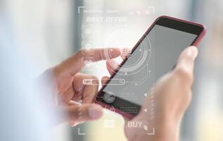 Close-up shot of A hand operating a smartphone. photo