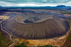 Large Hverfjall volcano crater is Tephra cone or Tuff ring volcano on gloomy day in Myvatn area at Iceland photo