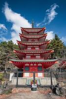 Front of red Chureito pagoda with blue sky in Fujiyoshida photo