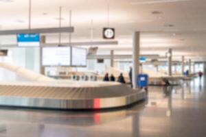 Blurred scene Passenger at baggage claim photo