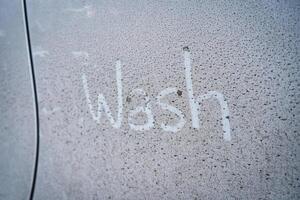 Dirty and mud stain on car surface photo