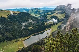 Lake Fahlensee from summit mountain in Swiss Alps during summer at Switzerland photo