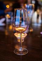 Empty wine glass luxury and glossy on wood table photo