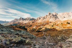 French Alps landscape of rocky Massif Des Cerces with Main De Crepin peak on wilderness in autumn at Hautes Alpes, France photo