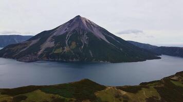 Aerial view of the unique Krenitsyn volcano on Onecotan Island video