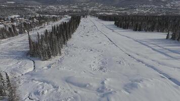 Aerial. the mountain slope at the beginning of the season without ski marks video