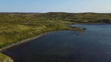 Aerial. Abandoned old building on the shore of the Sea of Okhotsk video