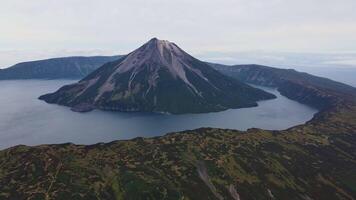 Aerial view of the unique Krenitsyn volcano on Onecotan Island video