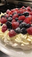 AI generated Pavlova, beautifully decorated pavlova topped with fresh berries and whipped cream, background image, generative AI photo