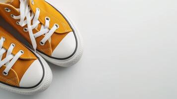 AI generated Amber canvas shoes isolated on flat white background with copy space for advertisement. Generative AI photo