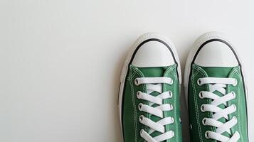 AI generated Green canvas shoes isolated on flat white background with copy space for advertisement. Generative AI photo