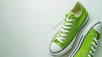 AI generated Green canvas shoes isolated on flat white background with copy space for advertisement. Generative AI photo