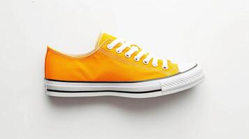 AI generated Orange canvas shoes isolated on flat white background with copy space for advertisement. Generative AI photo