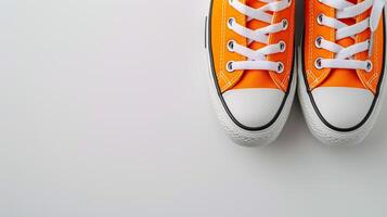 ai generado naranja lona Zapatos aislado en plano blanco antecedentes con Copiar espacio para anuncio publicitario. generativo ai foto