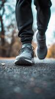 ai generado de cerca retrato de un del hombre pies caminando vistiendo Deportes zapatos, generativo ai foto