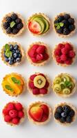 AI generated Fruit Tartlets, variety of fruit tartlets arranged in a visually appealing pattern on a white background, background image, generative AI photo