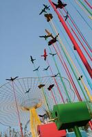 Decorative pillars with birds on top of the pillars green and red mailbox amusement park decoration picture photo