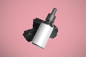 Floating Dropper Bottle Mockup with Charcoal isolated photo