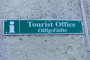 Tourist office sign on the wall photo