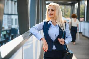 Portrait of business woman smiling outdoor photo