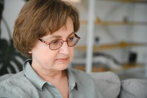 Portrait of handsome grandmother at home. photo