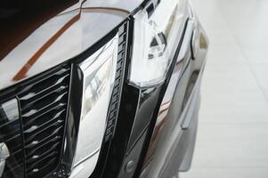 headlight of modern prestigious car close up. photo
