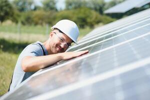 confident man and power solar station photo